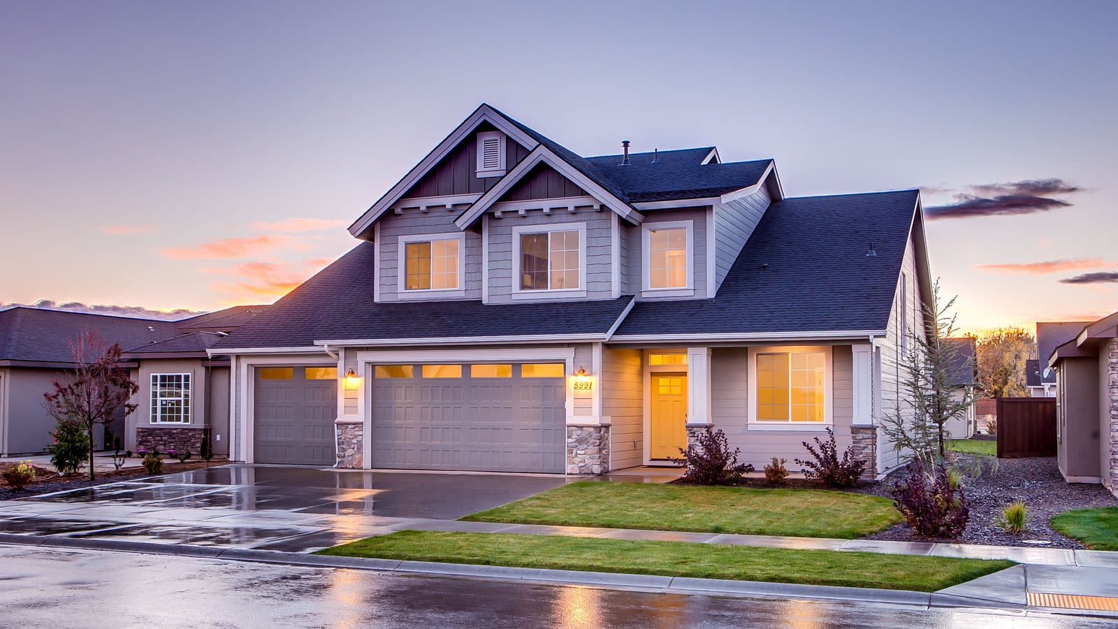 A two-story house at dusk